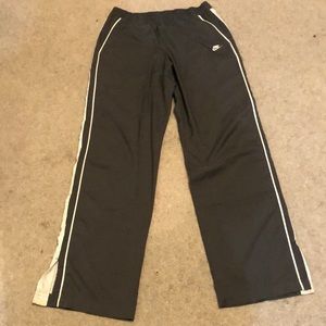 grey and white nike track pants